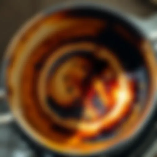 A close-up of a burnt pot interior with residue and stains