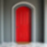 A stylish gray wall with a contrasting bold door color
