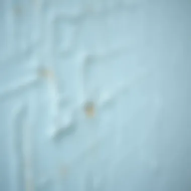 Close-up of light blue paint texture on a wall