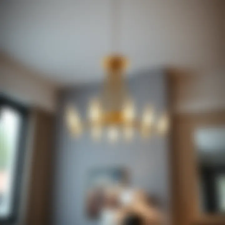 Minimalist chandelier with sleek lines and metallic finish.