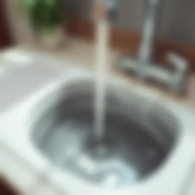 Clogged Kitchen Sink Clogged kitchen sink with water pooling