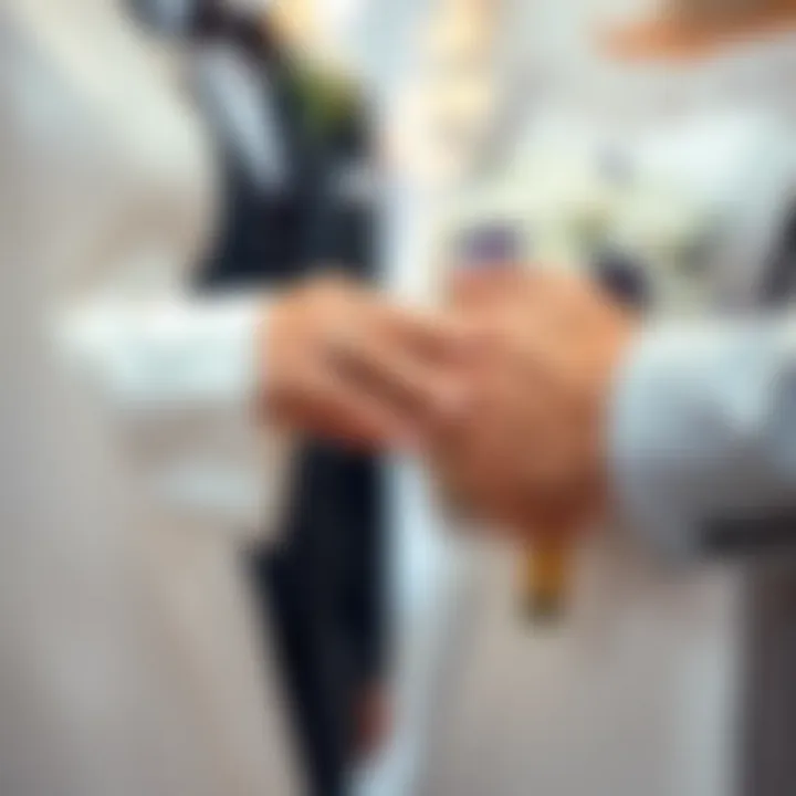 Close-up of bride and groom's hands exchanging rings