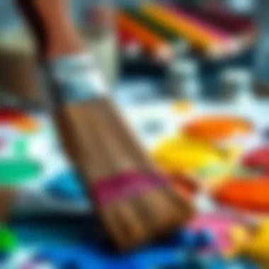 Close-up of paintbrush on a palette with colors